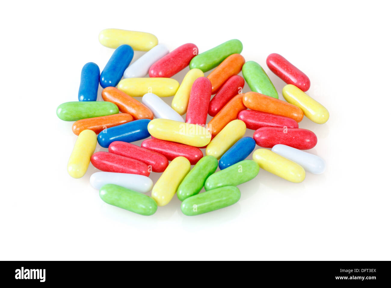 close up of colorful licorice unsorted sweets on white background Stock Photo