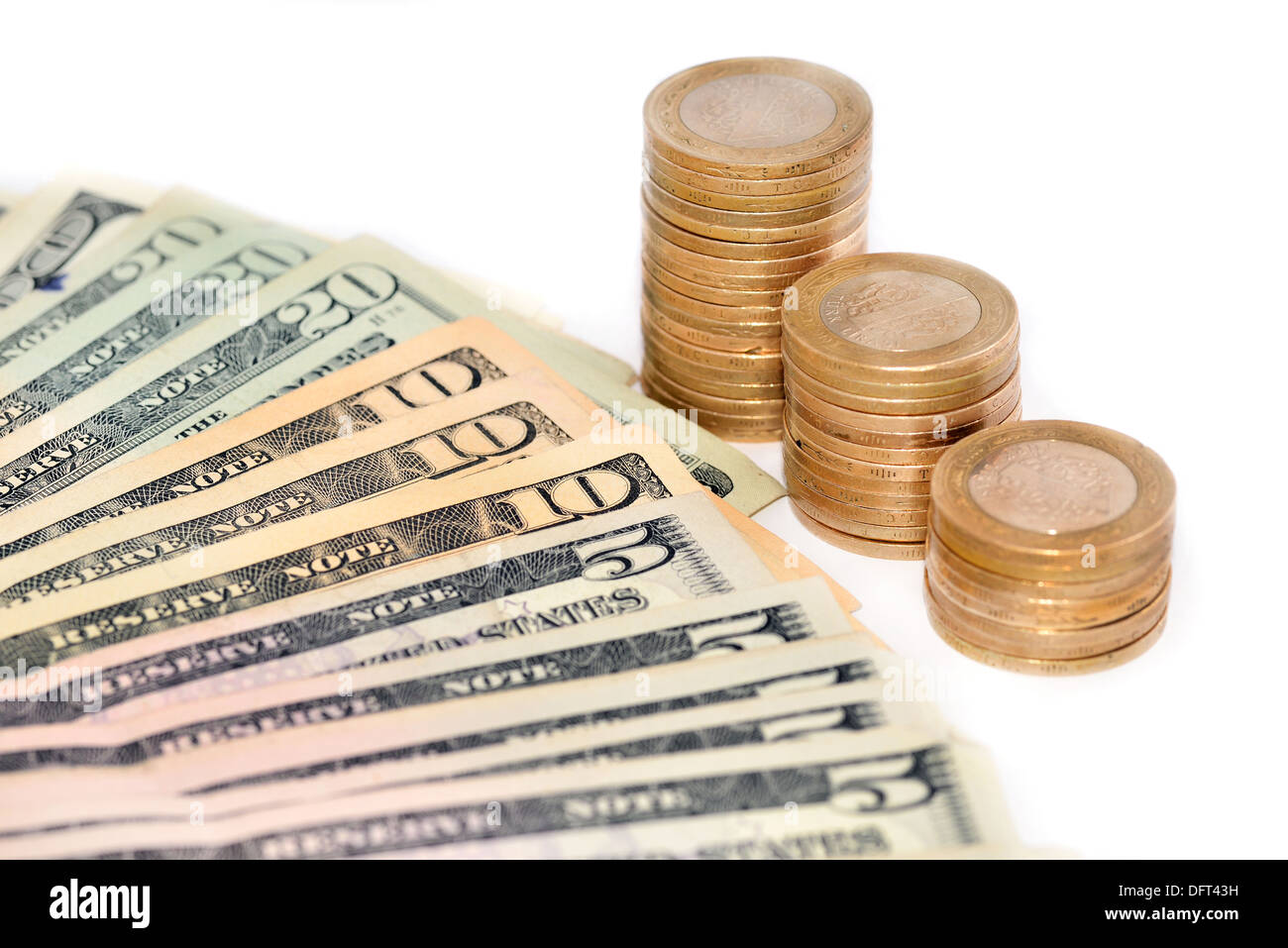 american dollars and coins on the isolated background Stock Photo