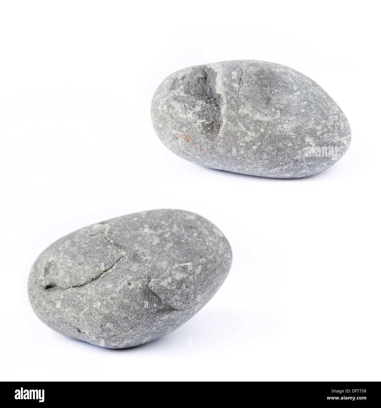 Two rocks on plain background Stock Photo