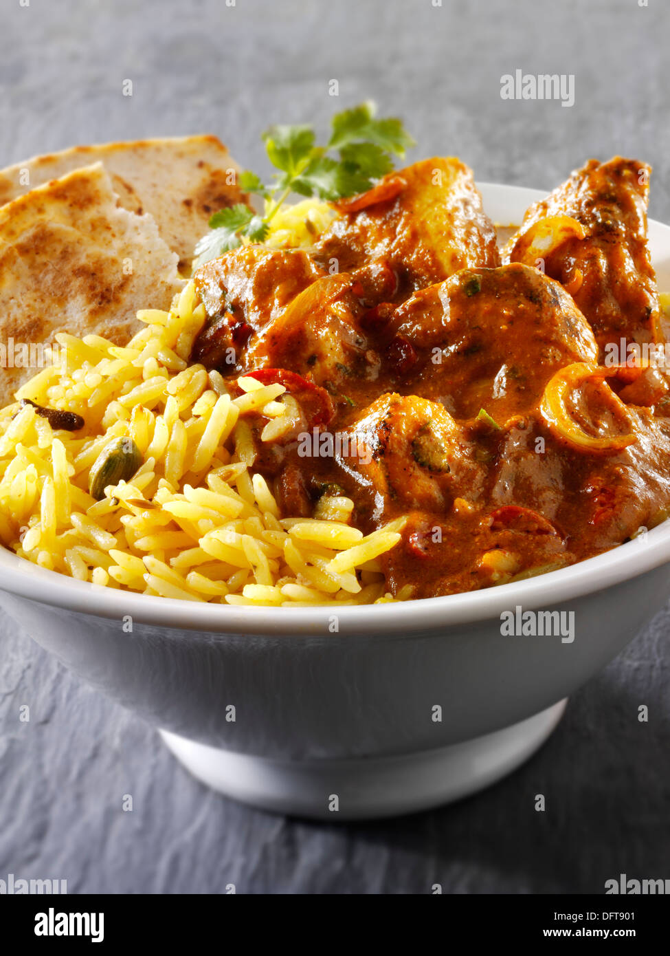Balti Chicken Indian Curry and pilau rice Stock Photo