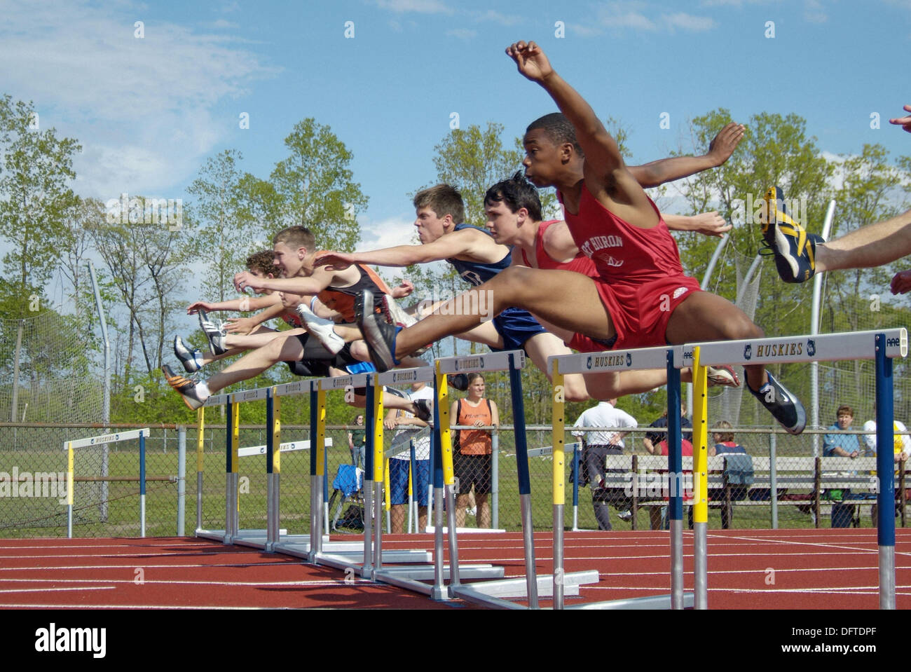 Boy jumping hurdles hires stock photography and images Alamy