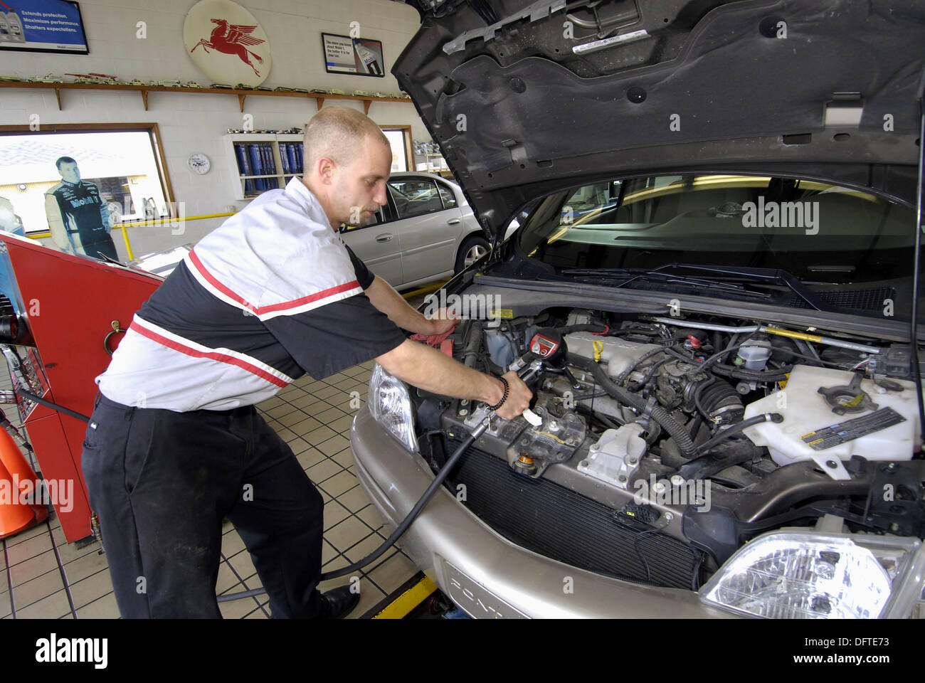 Quick oil change garage where drive in customers have oil changed in