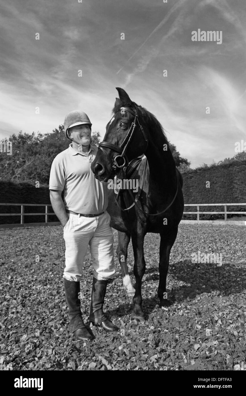 Richard Richardson stands with his 20 year old horse. Full livery