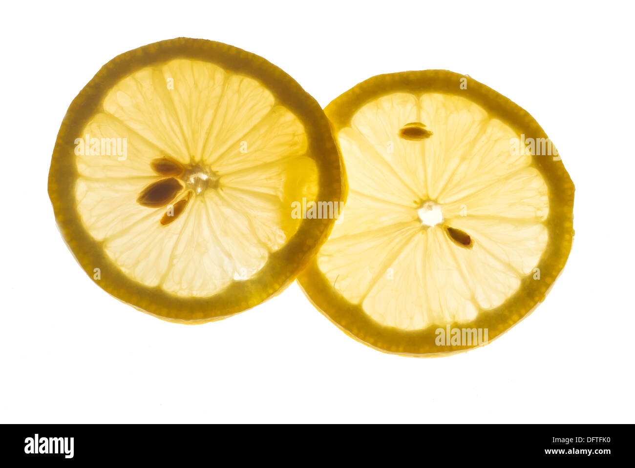 Pair of lemon slice isolated on white. Stock Photo