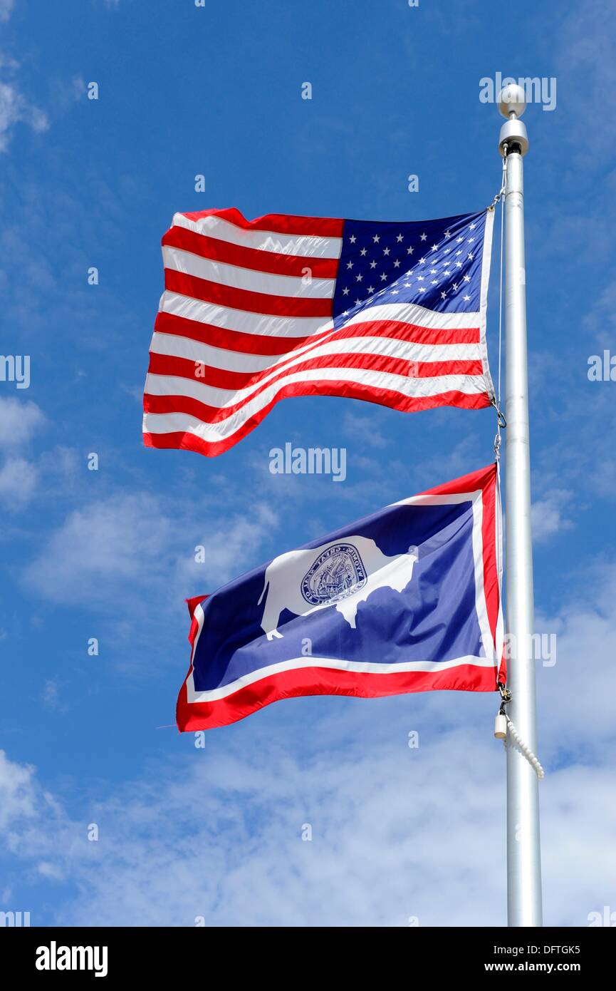 Welcome Center Wyoming US flag pole display wave wind Stock Photo