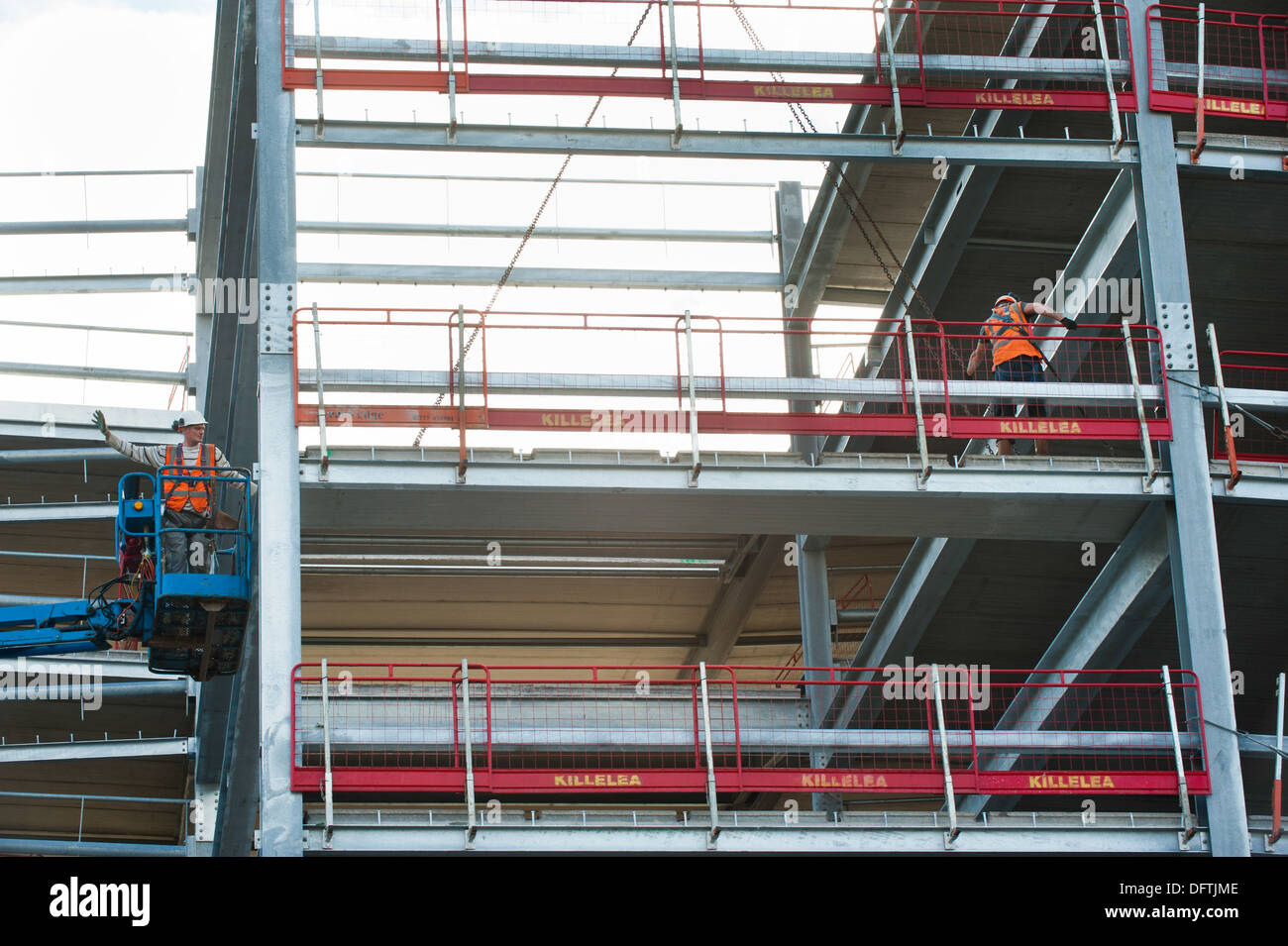 Construction workers building a multistorey car park at Telford