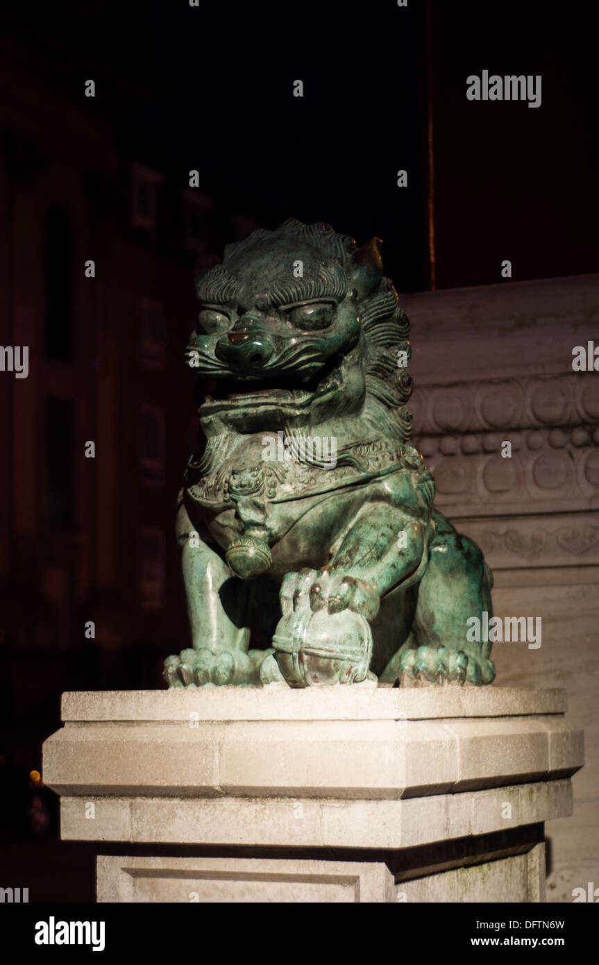 Chinese lion lit at night Stock Photo