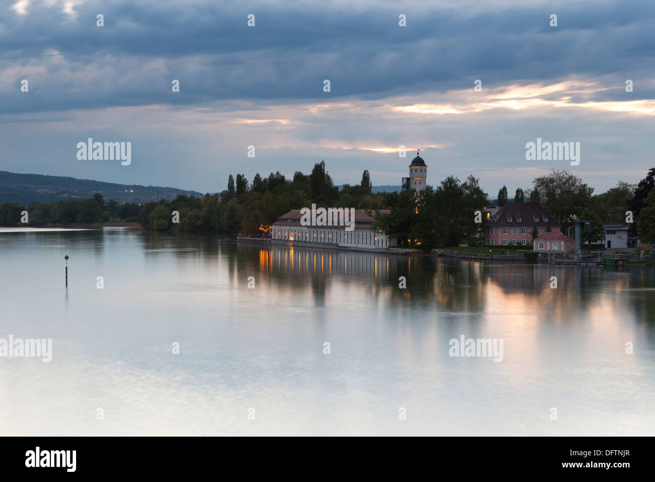 Dusk at the Seerhein or Lake Rhine River, with the old water tower and the Bleiche building, Stromeyersdorf, Konstanz Stock Photo