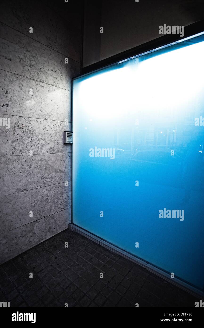 Housing Portal illuminated in blue Stock Photo Alamy