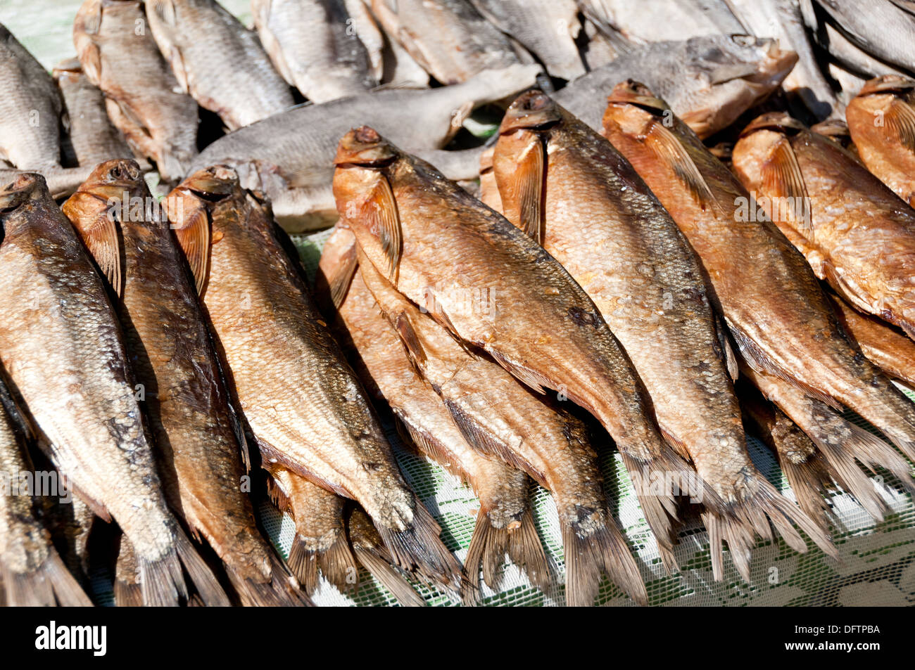 Dried tasty fish lies in the market Stock Photo