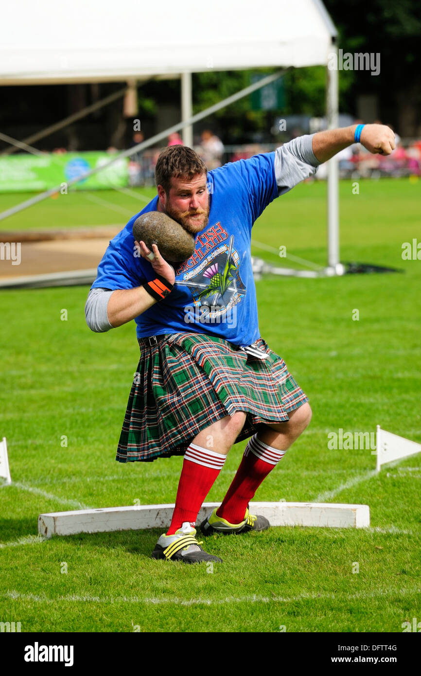 Stone Put, a discipline in the Highland Games, Inverness, Highlands, Scotland, United Kingdom Stock Photo