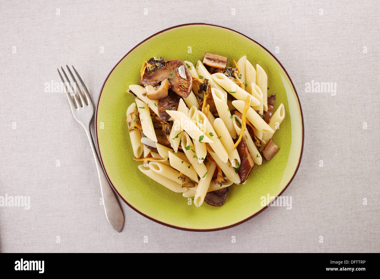 Yellow foot and red pine mushroom pasta dish Stock Photo Alamy