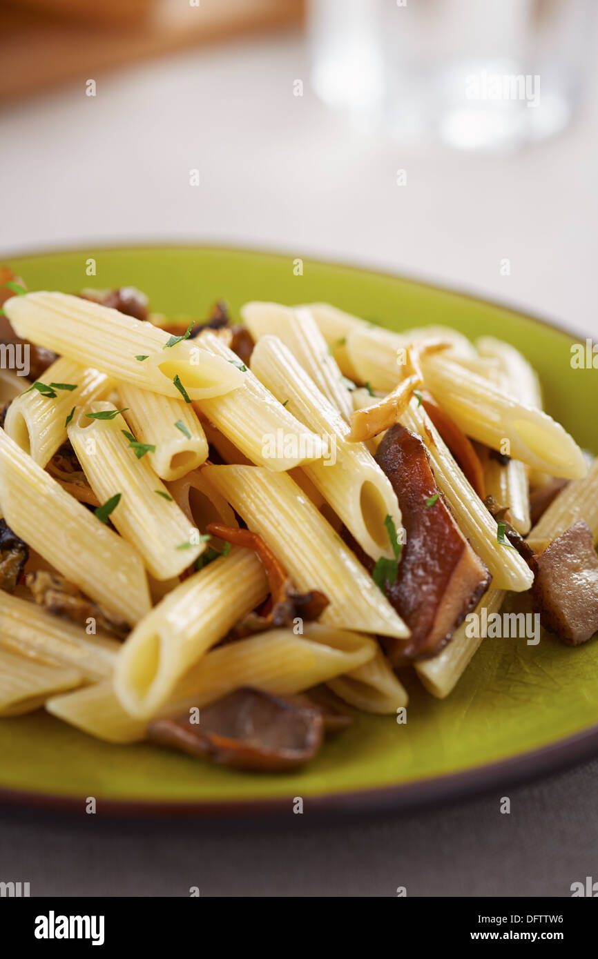 Yellow foot and red pine mushroom pasta dish Stock Photo Alamy