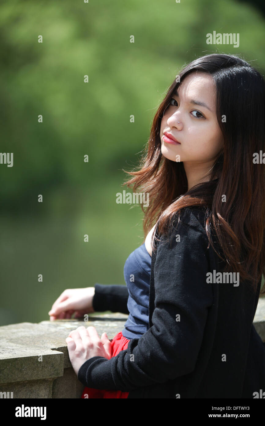 Attractive girl standing on bridge hi-res stock photography and images ...