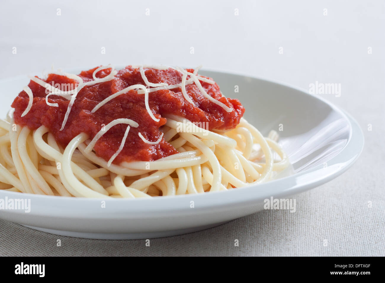 Italian spaghetti pasta with tomato sauce and cheese Stock Photo - Alamy