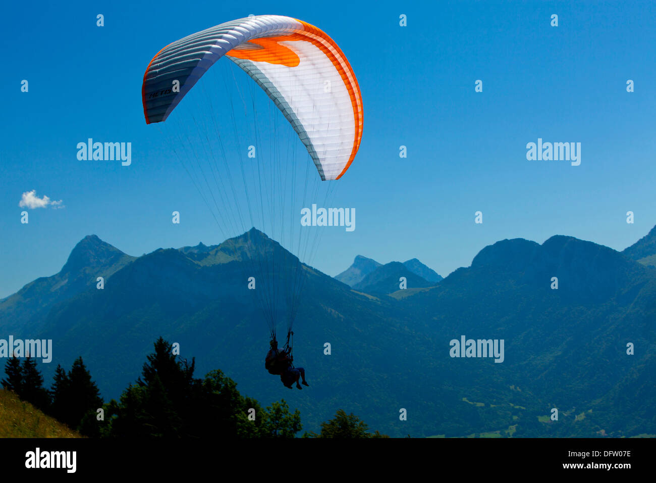 Paragliding over the alps in the Haute Savoie region of France Stock Photo