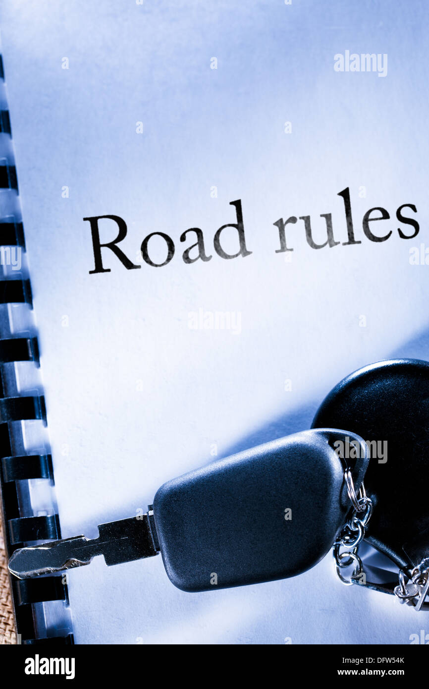 Road rules and car key Stock Photo