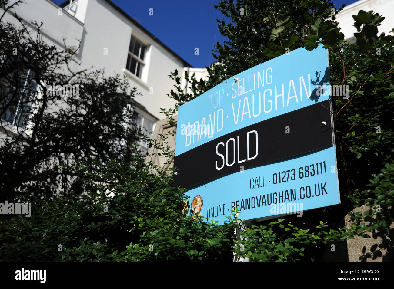 Brand Vaughan estate agent board in Brighton sold sign outside property