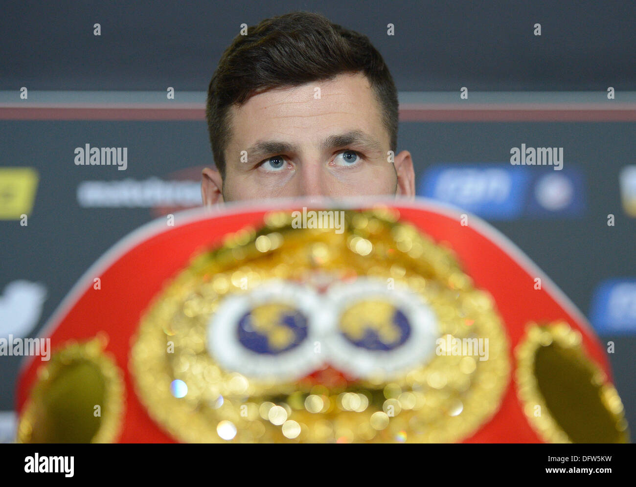 Stuttgart, Germany. 09th Oct, 2013. The IBF world champion Darren Barker from Great Britain answers questions during a press conference in Stuttgart, Germany, 09 October 2013. The boxing match against Felix Sturm will take place on 07 December 2013 in Stuttgart. Photo: DANIEL MAURER/dpa/Alamy Live News Stock Photo