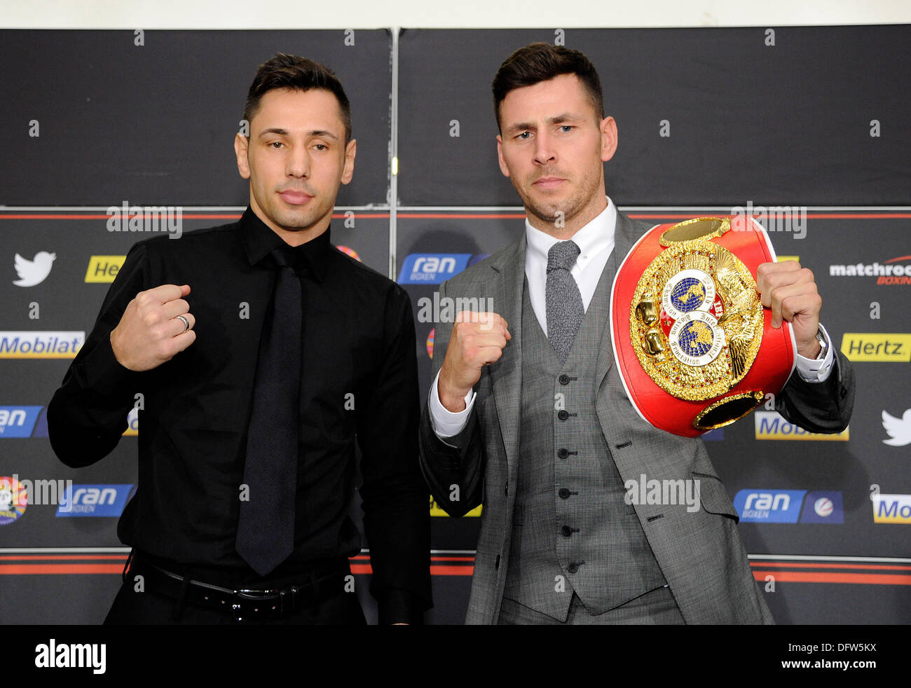 Stuttgart, Germany. 09th Oct, 2013. Challenger Felix Sturm (L) and the IBF middleweight world champion Darren Barker from Great Britain pose during a press conference in Stuttgart, Germany, 09 October 2013. The boxing match for the IBF world championship will take place on 07 December 2013 in Stuttgart. Photo: DANIEL MAURER/dpa/Alamy Live News Stock Photo