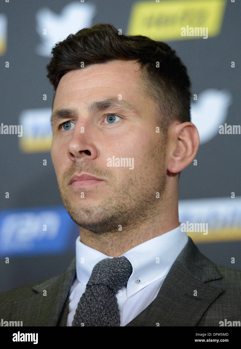 Stuttgart, Germany. 09th Oct, 2013. The IBF world champion Darren Barker from Great Britain answers questions during a press conference in Stuttgart, Germany, 09 October 2013. The boxing match against Felix Sturm will take place on 07 December 2013 in Stuttgart. Photo: DANIEL MAURER/dpa/Alamy Live News Stock Photo