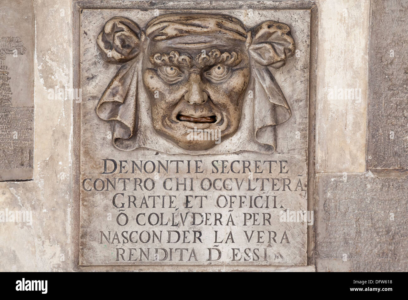 In the Doge's Palace, a postbox used for anonymous denunciations. Venice. Boite aux lettres pour dénonciations anonymes. Venise. Stock Photo