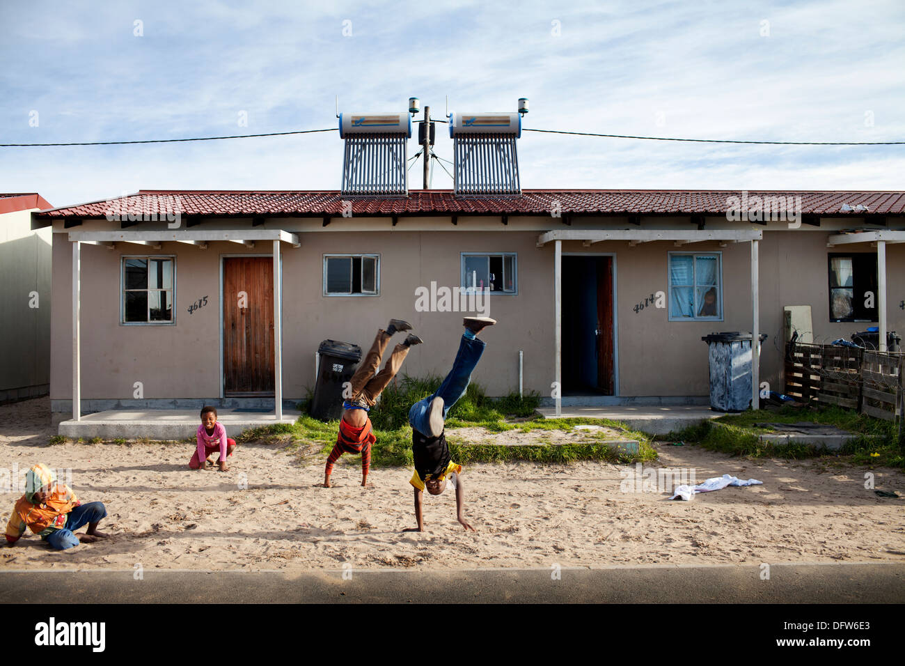 Cape Town South Africa - Children play in a newly developed RDP housing project in Langa where all houses are equipped with Stock Photo
