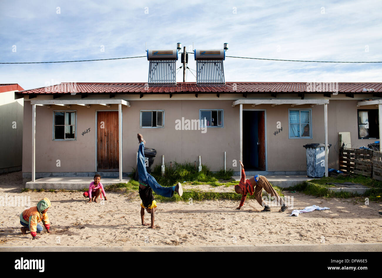 Cape Town South Africa - Children play in a newly developed RDP housing project in Langa where all houses are equipped with Stock Photo