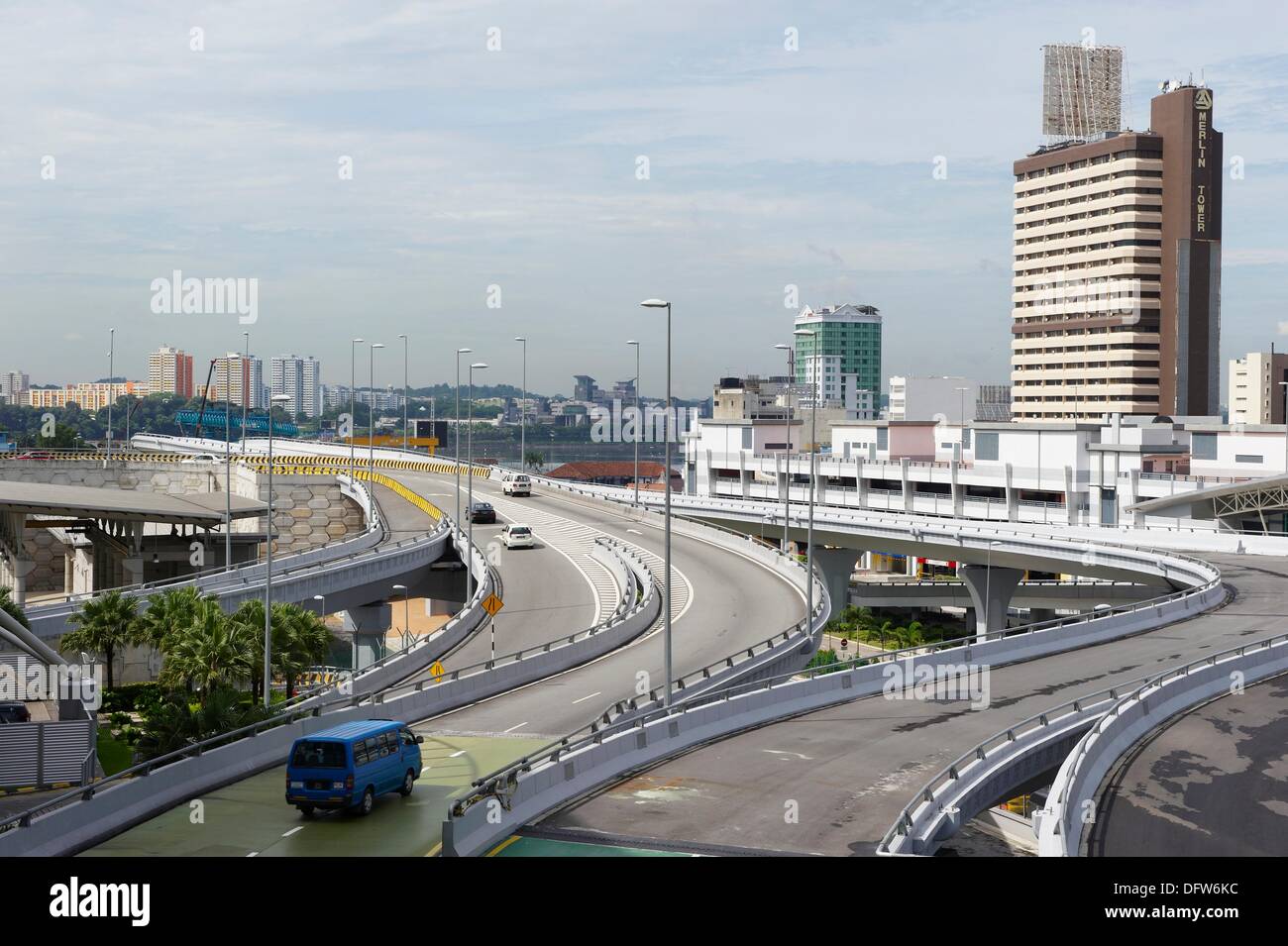 Elevated roads heading to the border with Singapore in Johor Bahru The coloured buildings in the far background is Woodland Stock Photo