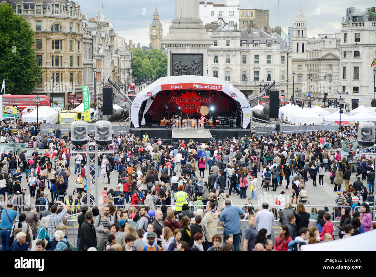 Japan matsuri festival in London. Crowds of people and stage with Big Ben. Saturday 5th October 2013 Stock Photo