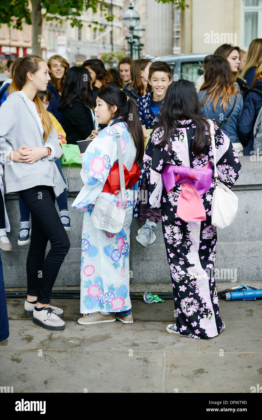 Japanese girls wearing traditional costume of kimono at matsuri festival in London England Saturday 5th October 2013 Stock Photo
