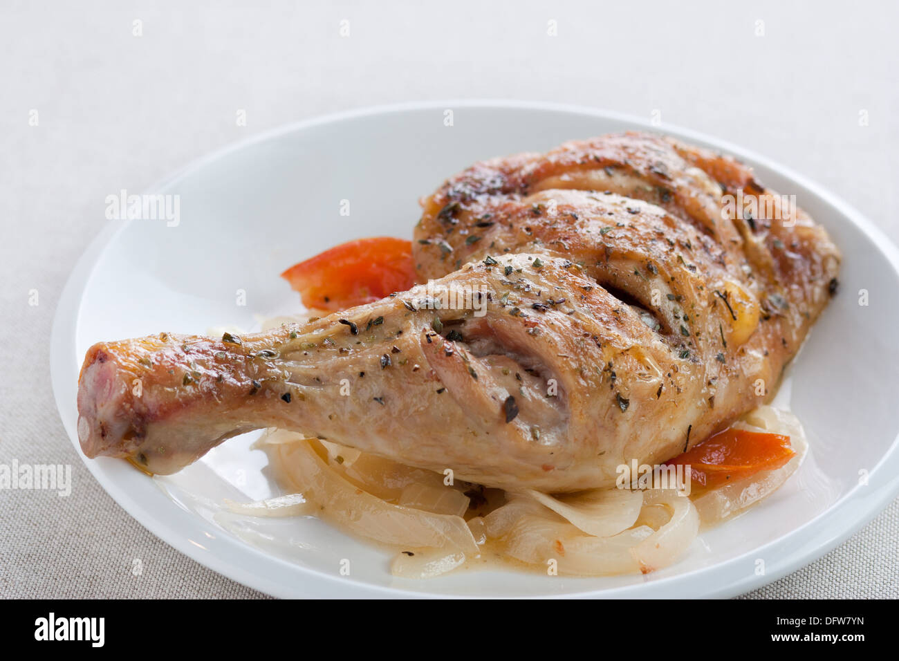 Roast chicken on a dish Stock Photo