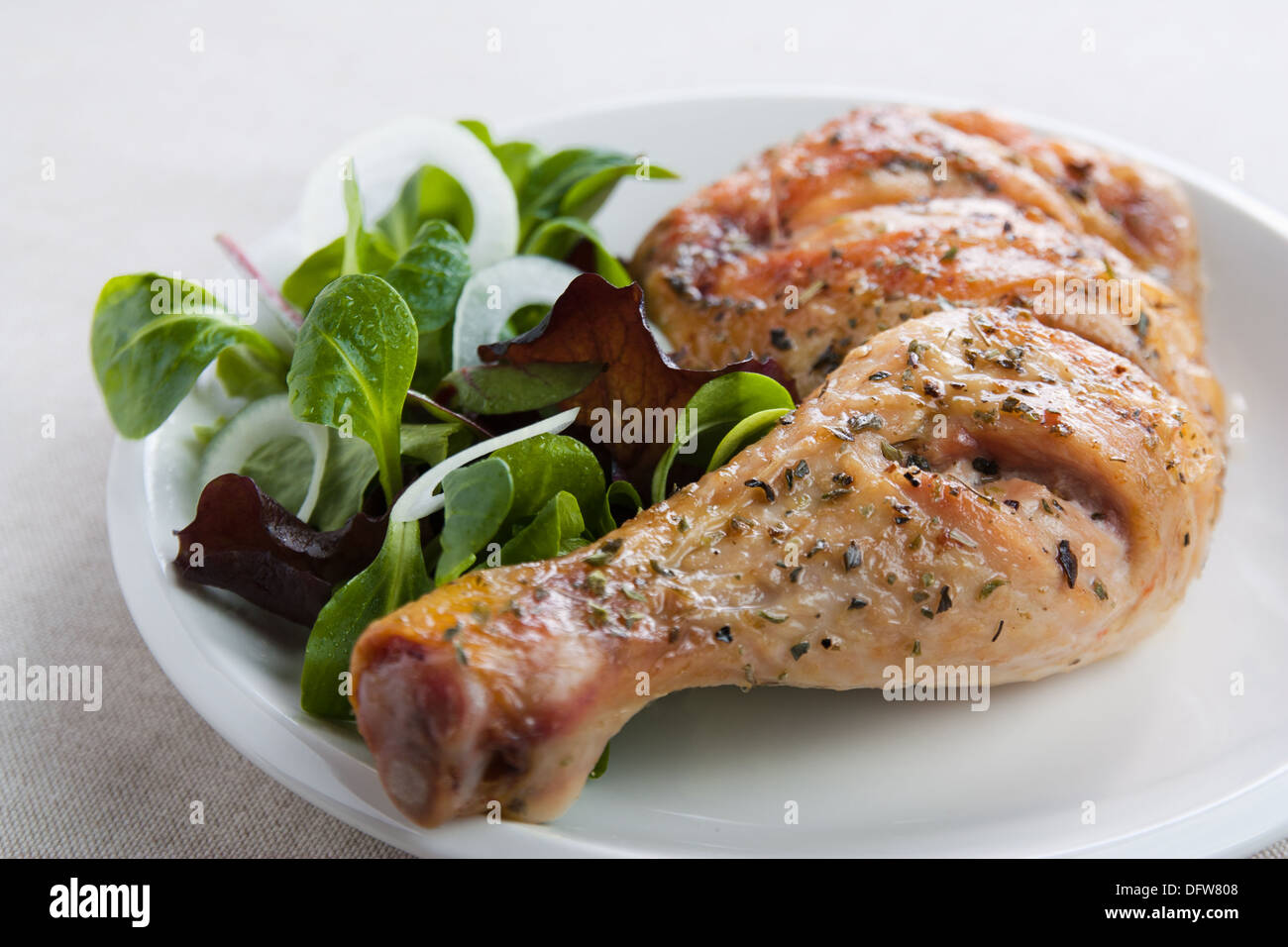 Roast chicken on a dish Stock Photo
