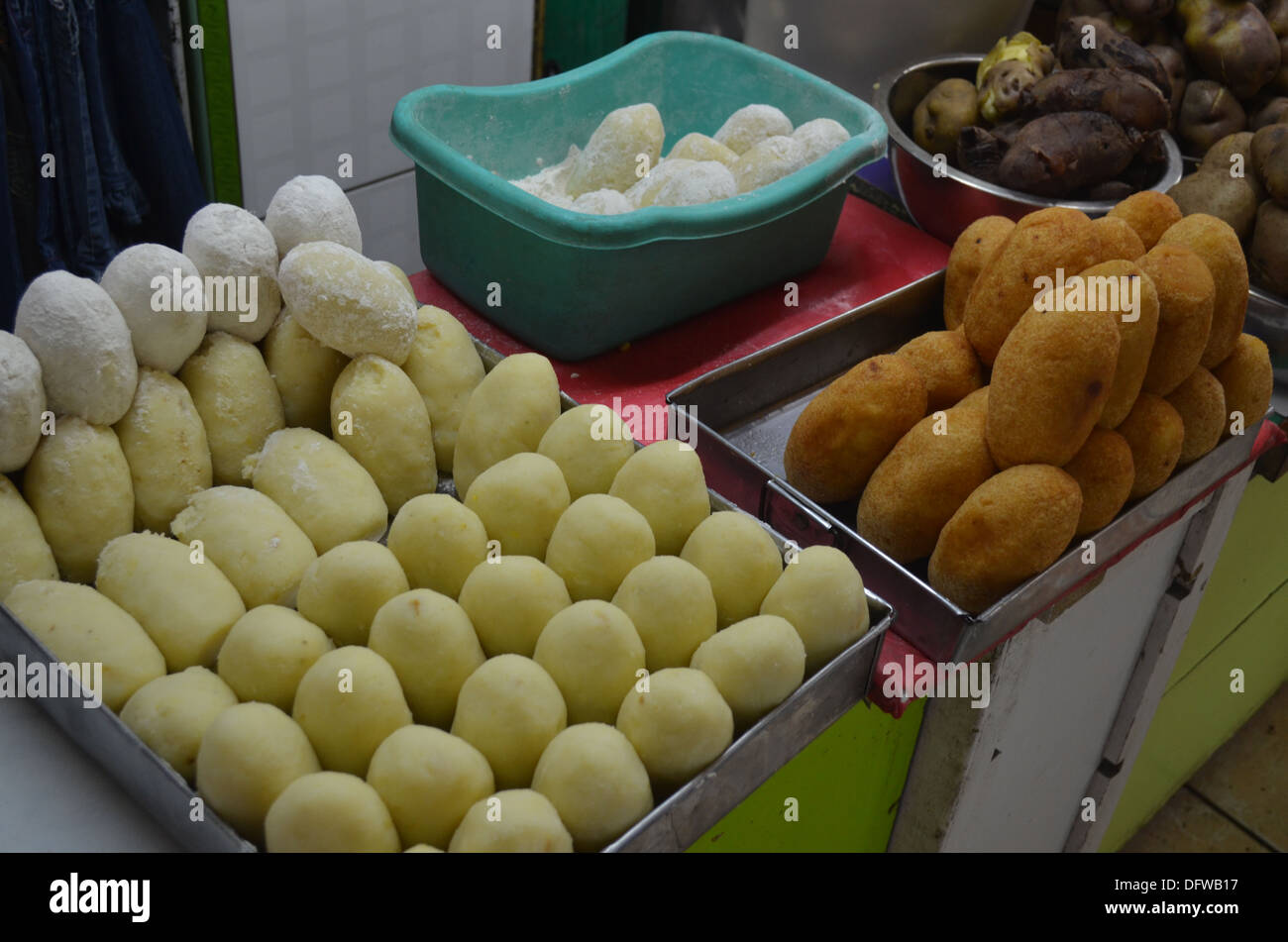 The typical Peruvian dish of Papa Rellena (stuffed potato) being