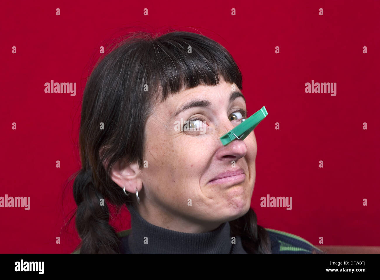 Peg nose woman hires stock photography and images Alamy