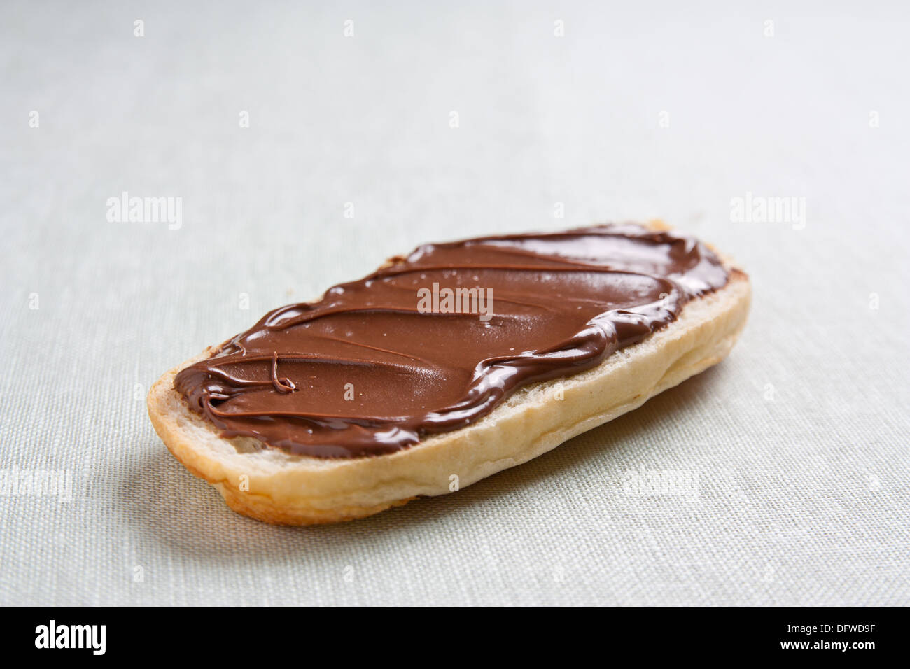 Milk chocolate on milky bread Stock Photo