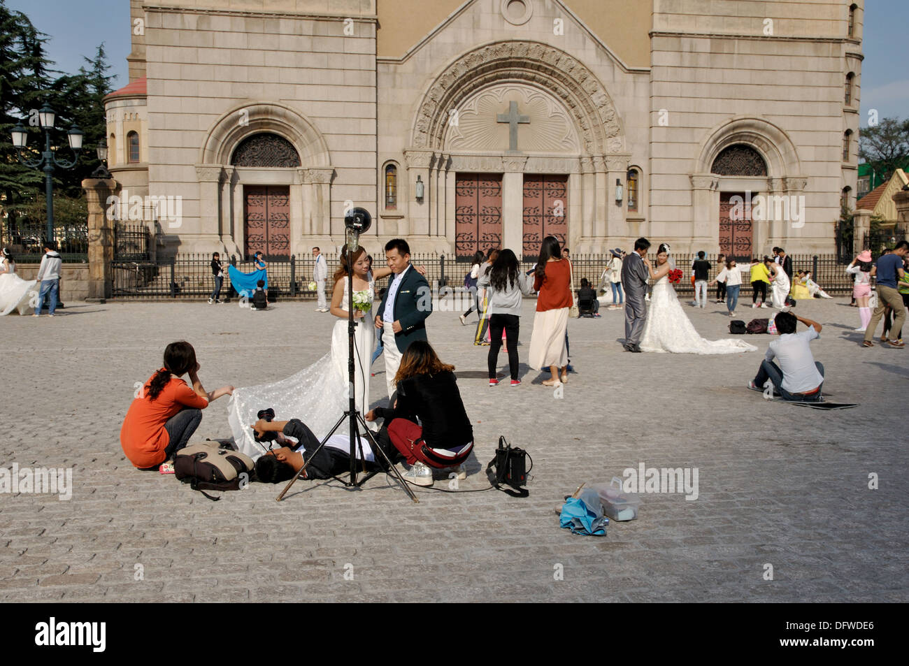 Wedding Photography outside St Michael's German Cathedral, Qingdao, Shandong, China. Stock Photo