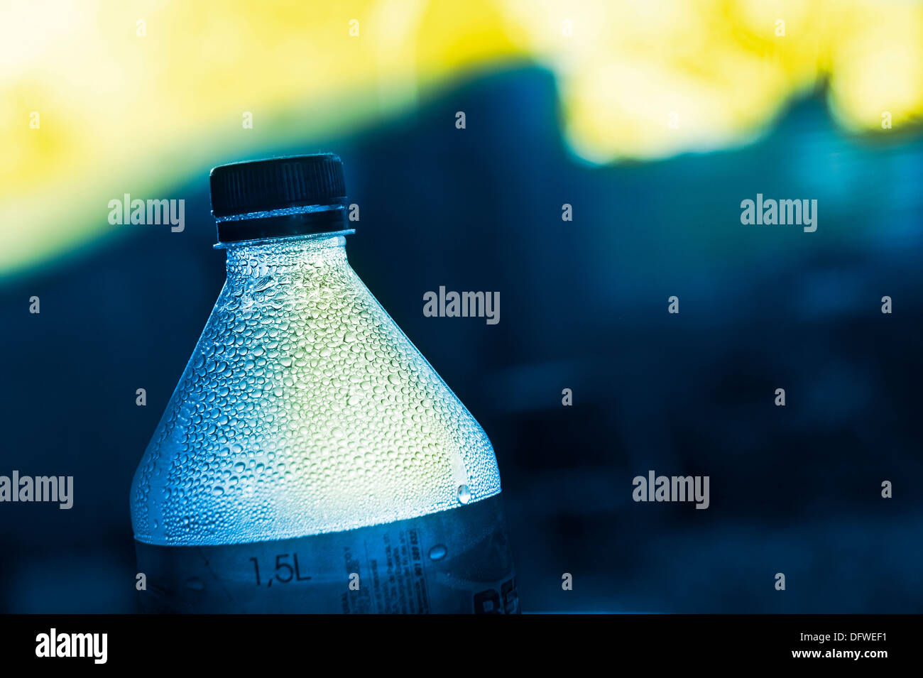 Top of a bottle to the light, bottled mineral water Stock Photo Alamy