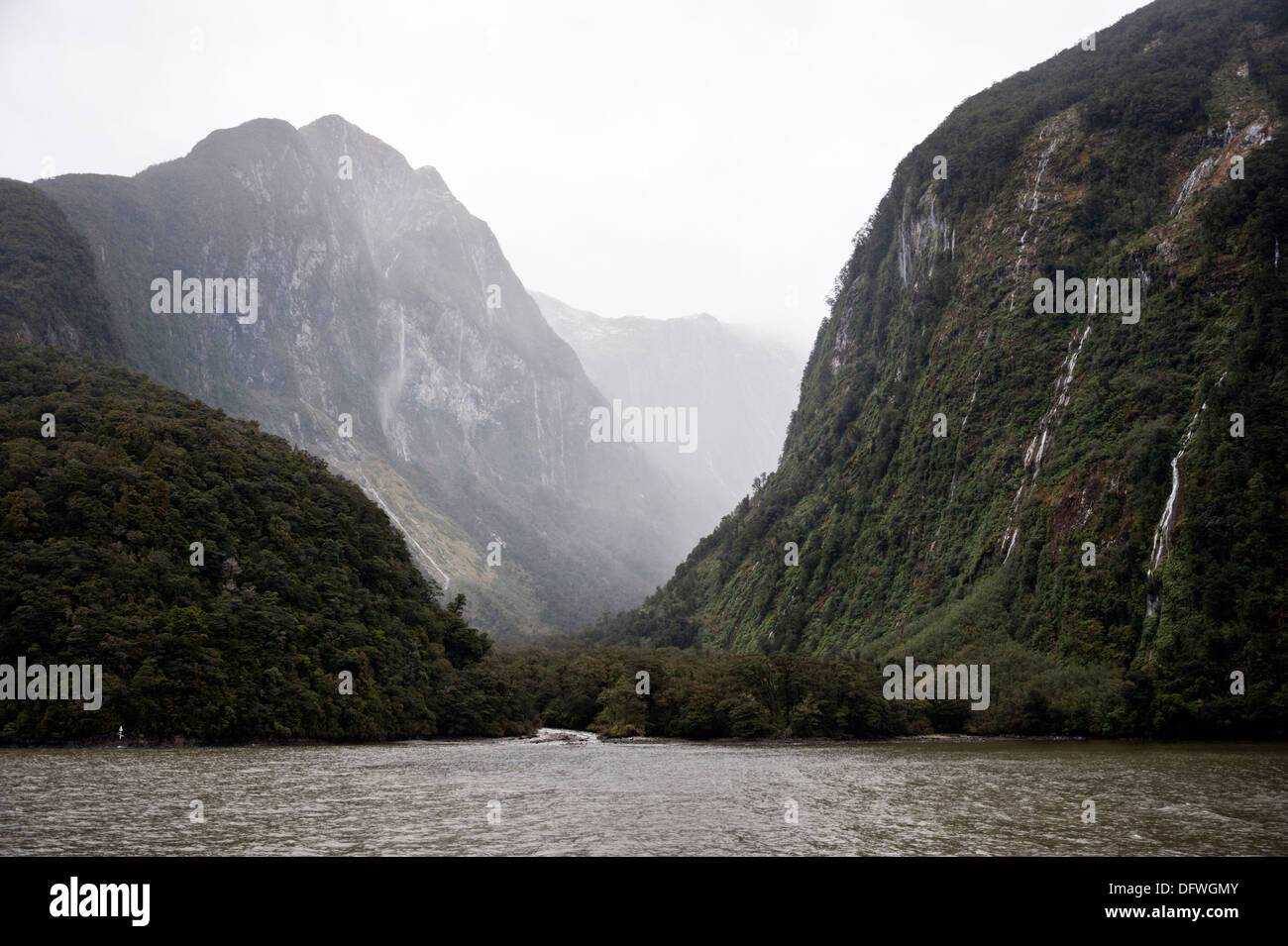 Doubtful Sound in mist and rain, Fiordland National Park, South Island, New Zealand Stock Photo