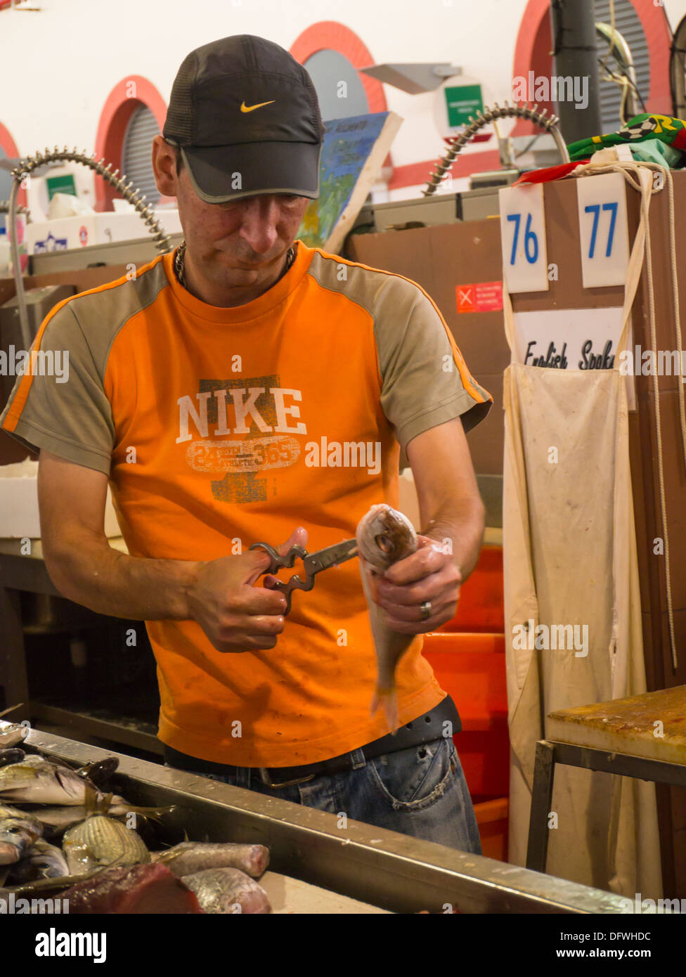 Portugal Algarve Loule fish market middle-aged man in Nike baseball Stock  Photo - Alamy