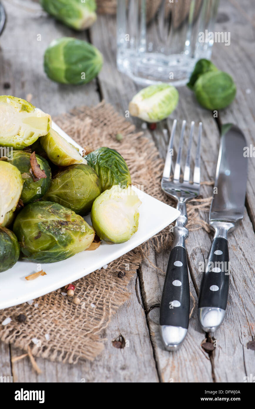 Portion of fried Brussel Sprouts with Ham and Onions Stock Photo