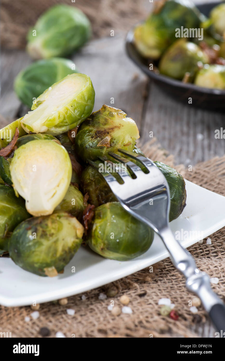 Portion of fried Brussel Sprouts with Ham and Onions Stock Photo