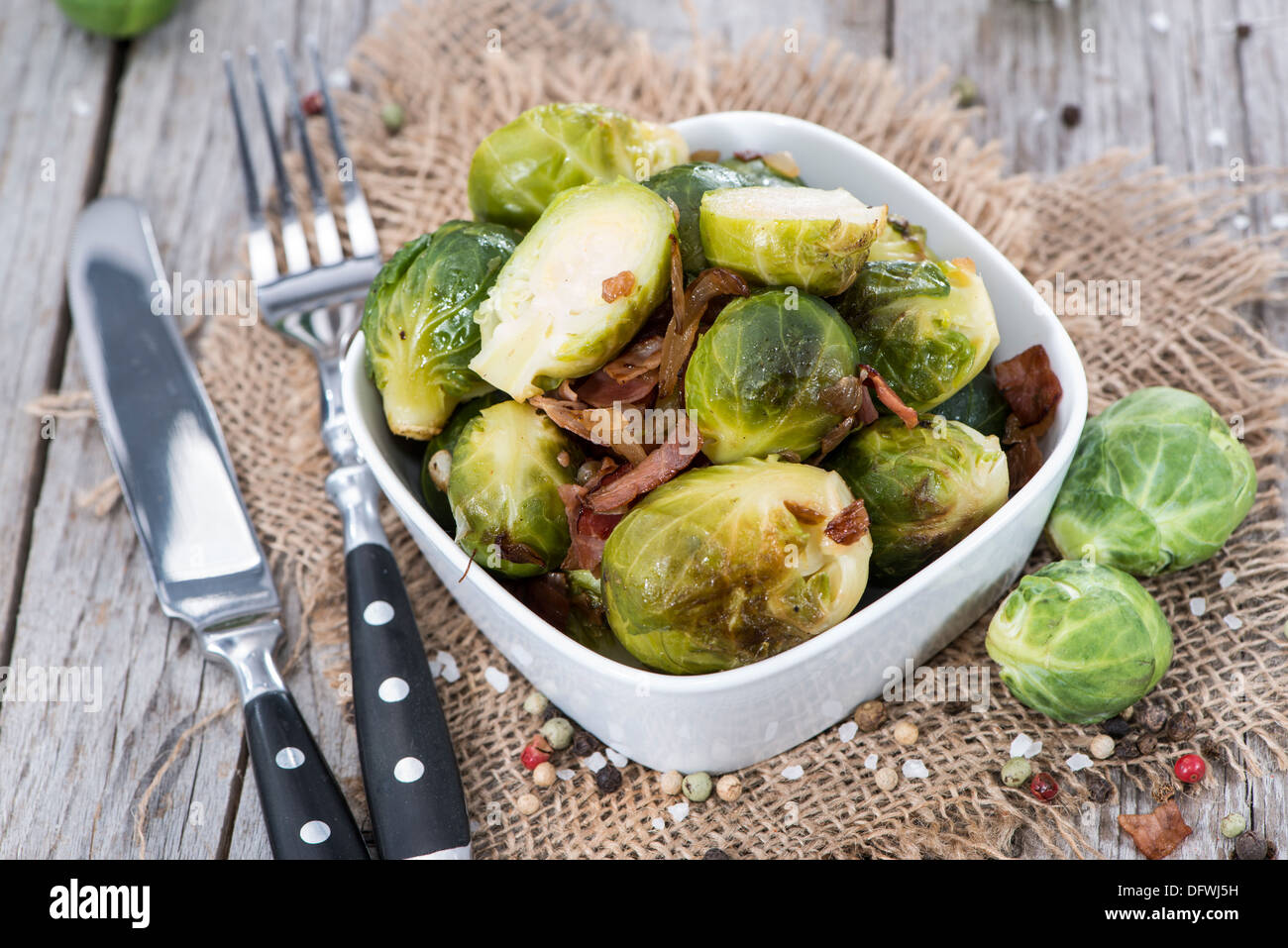 Cooked Brussel Sprouts with Ham and Onions Stock Photo