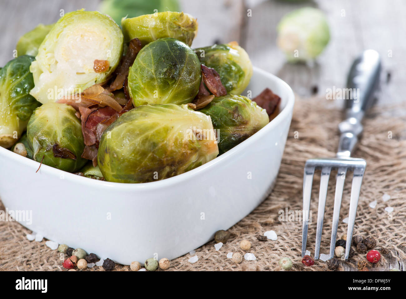 Fried Brussel Sprouts with Ham and Onions Stock Photo