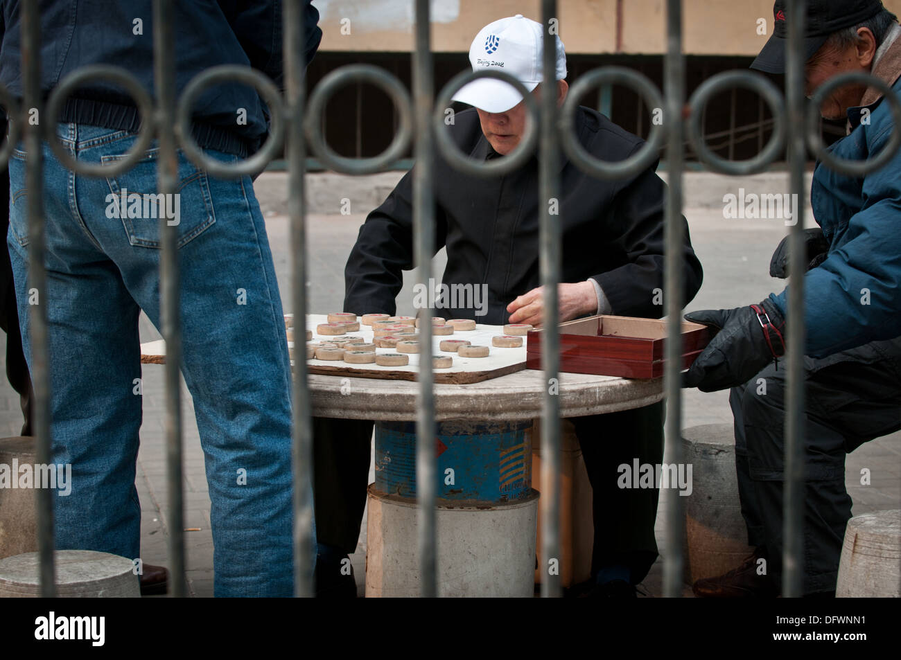 Chinese men playing Xiangqi also called Chinese chess in Beijing, China Stock Photo