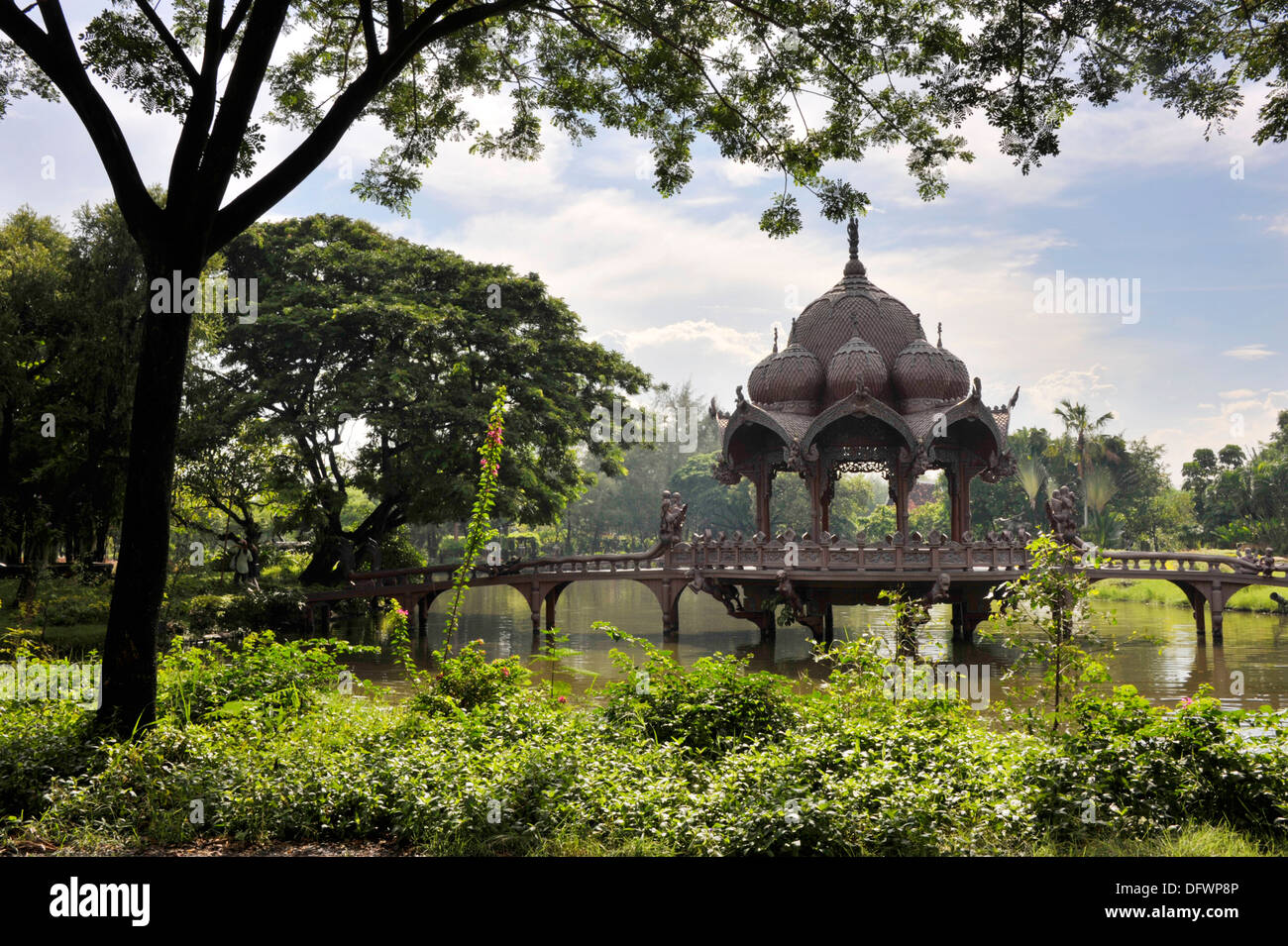 Ornate bridge crossing to the Garden Of The God at Thailand's Ancient Siam attraction near Bangkok. Stock Photo