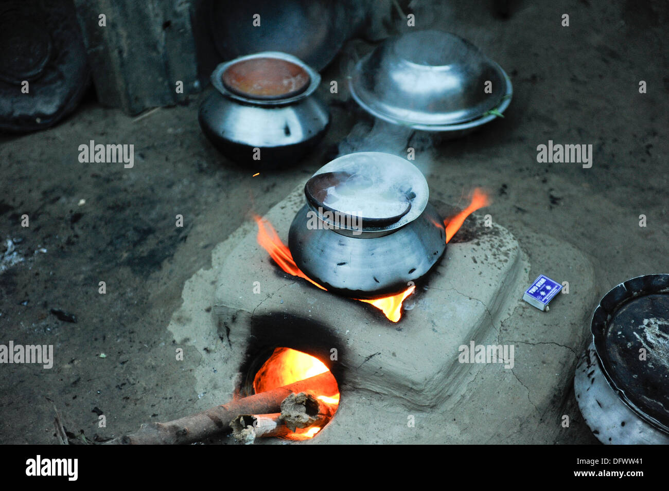 Bangladesh, Region Madhupur, Garo household, clay stove with fire and