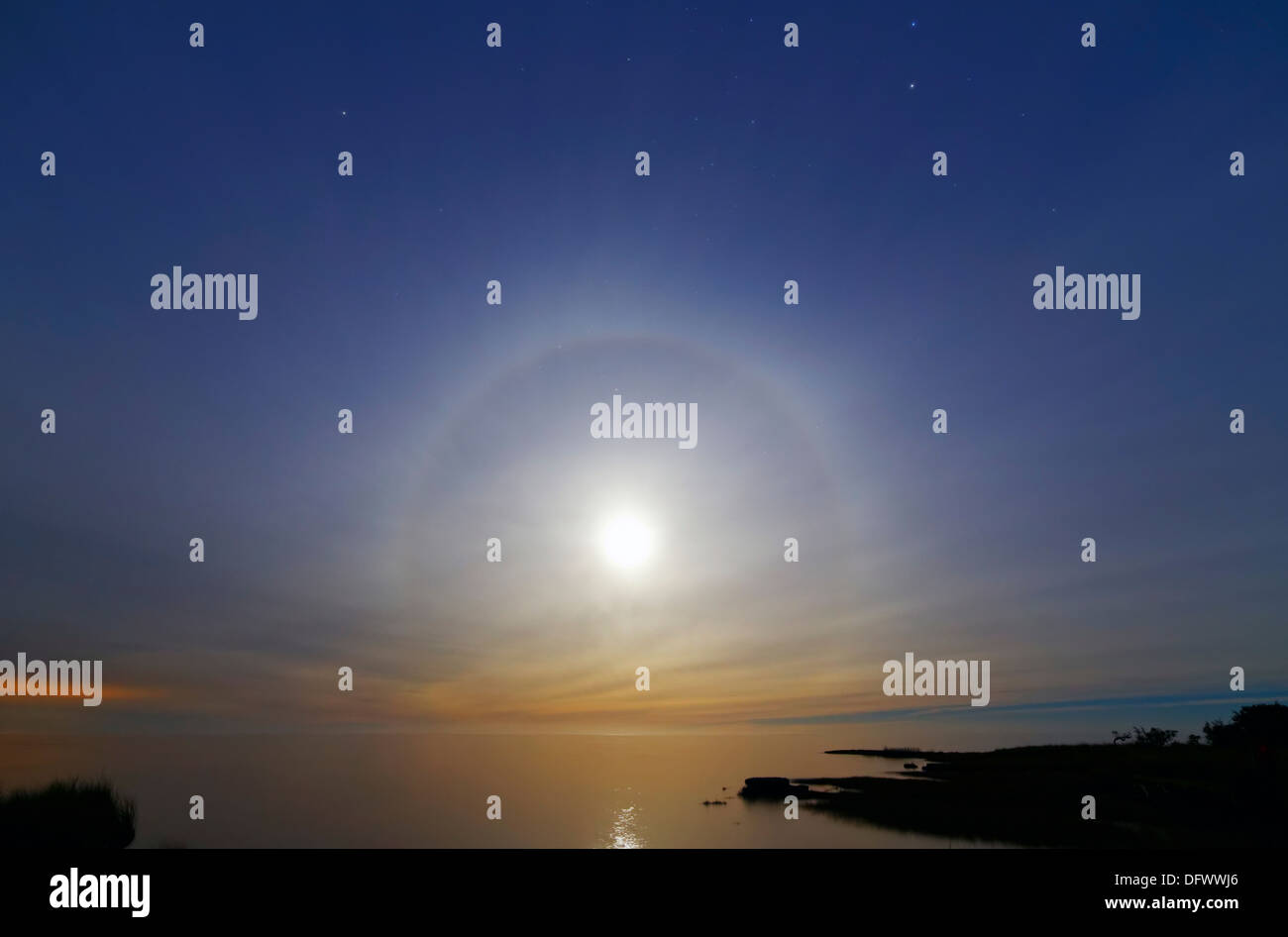 June 23, 2013 - A 22 degrees halo around the 2013 supermoon, Punta Piedras, Argentina. Stock Photo