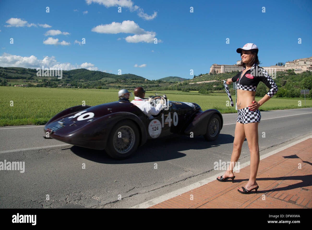 Mille Miglia, 1000 Miglia, Motor Race, Vintage, Old, Car, Oldtimer, Pit  Babe, Girl, Woman, chick, checked, flag, Assisi, italy Stock Photo - Alamy