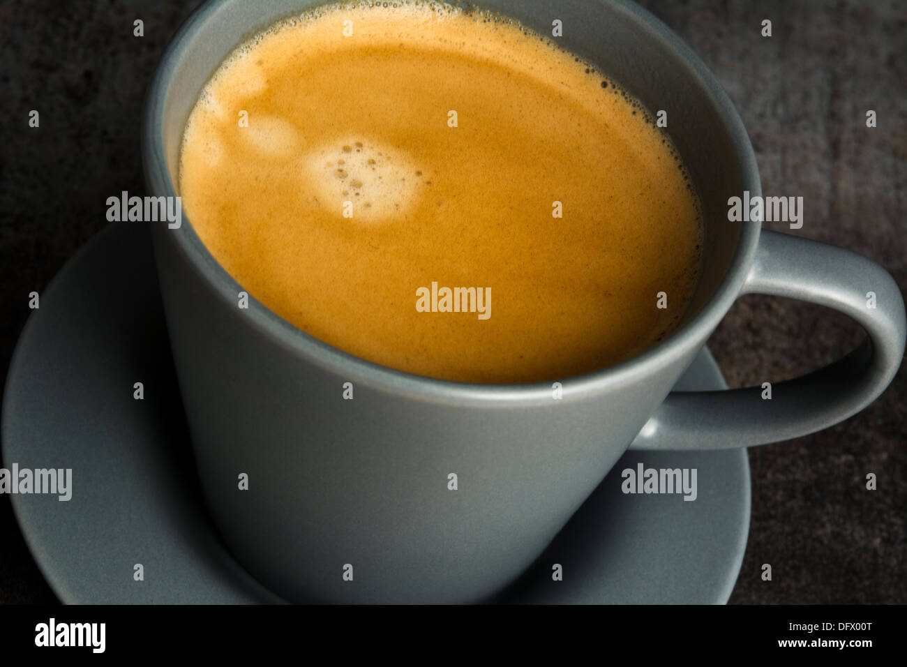 Espresso coffee in gray cup and saucer Stock Photo